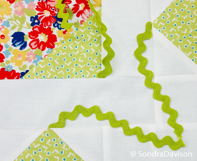 using rick rack for flower stems on quilt block